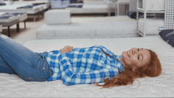 Woman Laying On Bed